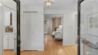 Step inside to a light-filled foyer offering a warm welcome and views into the heart of the home.