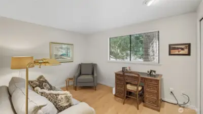 Versatile flex space perfect for a home office, reading nook, or guest room.