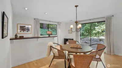 This lower level entertainer’s haven offers plenty of space for games, dining, or casual gatherings.