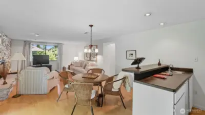 Host with ease in this lower-level living area complete with a wet bar and fireplace.