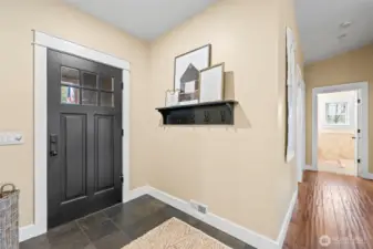 The front entrance is inviting, warm, and out of the way, providing space for your guests to comfortably transition into your home.