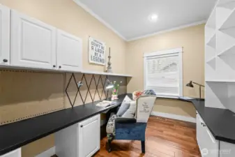 Private office, facing the street provides solitude while allowing you to keep an eye out for those Amazon deliveries.