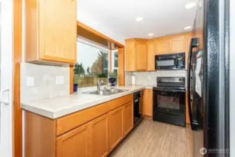 Kitchen  with Title Countertops