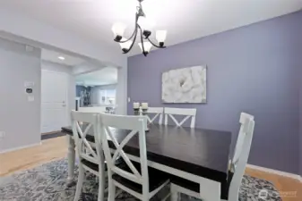 Open dining room is a lovely place to enjoy serving guests and convenient enough for less formal everyday meals.