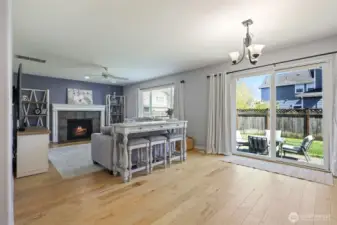 Appealing light wood floors and open design makes this main living space inviting and practical--a beautiful area for life to take place!