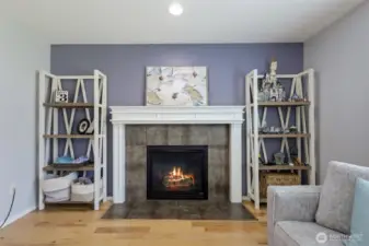 Gas fireplace is not only beautiful to look as a focal point, it brings an element of comfort and ambiance to this living space.