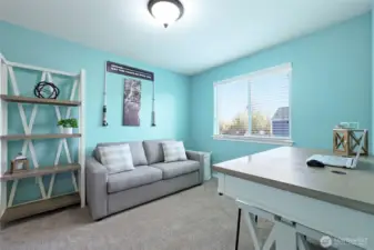 Fourth bedroom, with backyard view.