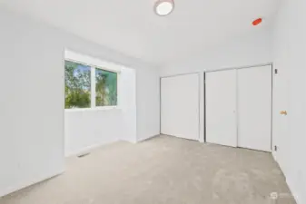 Double closets in the primary bedroom.