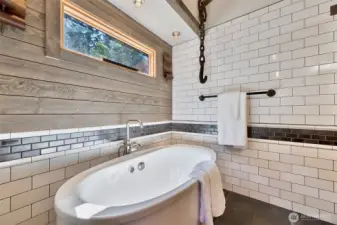 Kohler oval freestanding tub w/ bask heated surface