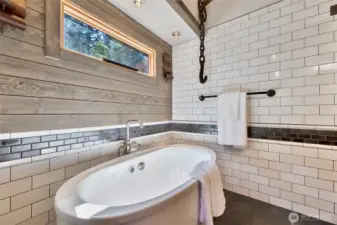 Kohler oval freestanding tub w/ bask heated surface