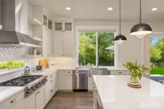 Ample storage is in this pretty kitchen including a spacious walk-in pantry.