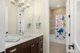 One side of the large Jack & Jill Bathroom.