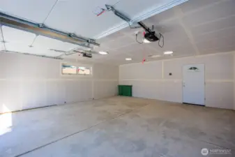Imagine all the projects & hobbies in this expansive garage.