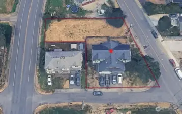 This updated duplex on a generous 1/3-acre lot offers exciting opportunities.
