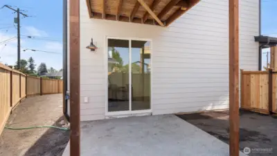 Lower level has covered patio and fully fenced yard.