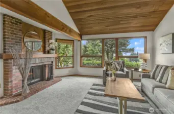 Living room with mountain and lake views