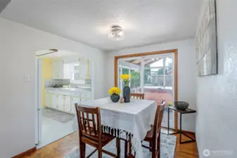 Original hardwood floors, we believe the hardwood is also under the carpet in the living room/hallway.