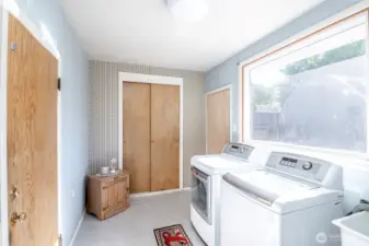 Large mudroom, enter from the garage or fenced backyard. Great to have a closet for pantry items as well.