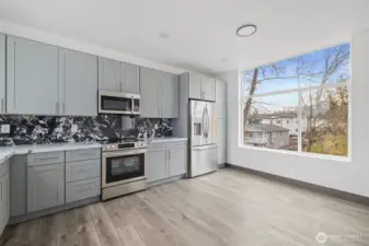Interior photos used in this presale listing are from newly constructed homes by the same builder, located at 8608 and 8612 #C, 42nd Ave S. The layout and high finishes will be similar.