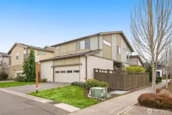 Alley access with a driveway and two car garage