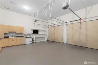 Second 2 car garage with canning kitchen and custom storage