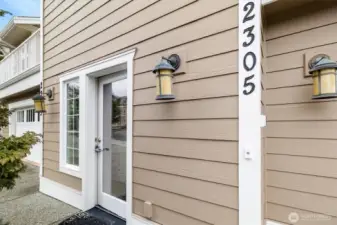 Secure, key-access entry shared exclusively between two residences