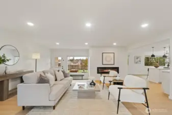 Generous living and dining spaces with new luxury vinyl plank flooring