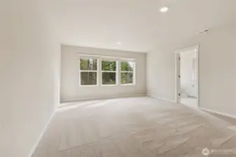 Generous primary bedroom with lots of natural light. Photos are representative only and may display different color package and/or upgrades.