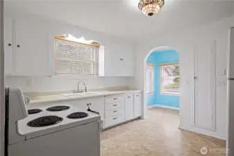 Kitchen wih view to small dining area.