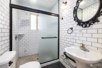 Tiled bathroom on the main level