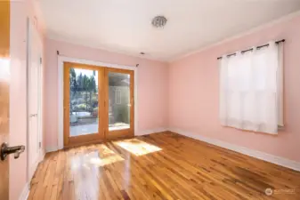 Main level bedroom has access to the outside deck.