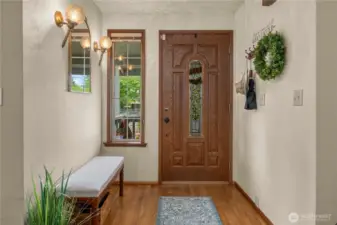 Inviting entryway that has plenty of space for guests to linger