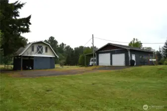 Barn features a hayloft and stalls for your animals.  The shop is 28 x 32.  Just the place for your tools and toys.