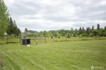 The home owners lovingly built a little league sized baseball field in the lower acreage so the neighorhood kids can practice. They have enjoyed sharing with their little community,