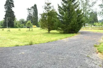 Additional driveway and RV parking pad.