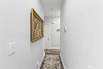 Hallway to 2nd bedroom and garage
