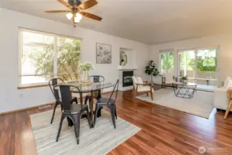 Open floor plan leads to the family room and extends out to the deck and fully fenced yard.
