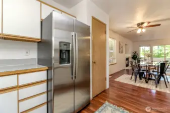 Pantry to the right of the fridge.