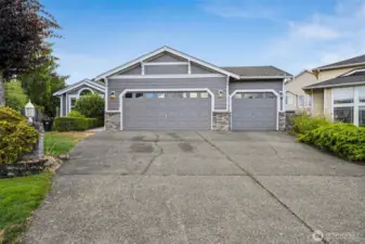 Fresh exterior paint adds to the beauty of this 1,760 sq ft Craftsman Home!