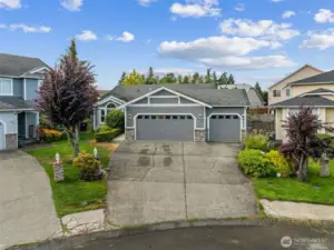 Enjoy this spacious 3 car garage, and extended driveway.