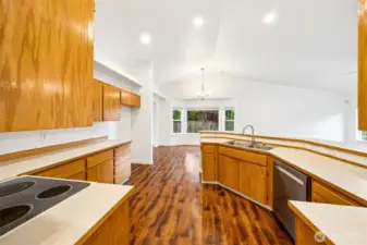 Natural light also floods through the large Bay window in the Eating Area, conveniently located off to the side of the Kitchen.