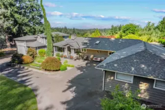Main home and detached RV garage with 719 sq ft guest home