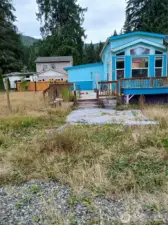 tiny home, room on the left and deck are additions