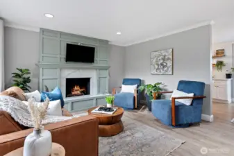 Updated living room with gorgeous fireplace
