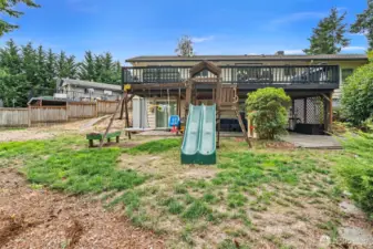 Backyard has tons of space for play or gardening