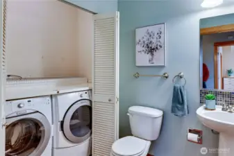 Utility room with 1/2 bath