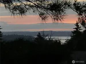 potential view from 2nd story or rooftop deck. Buyer to verify.