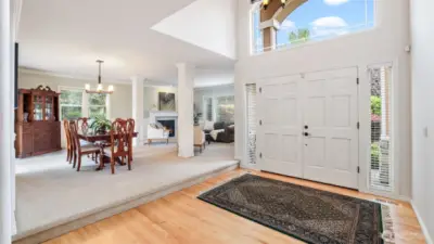 Step into a grand entry filled with beautiful, inviting natural light