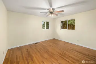 Bedroom on the left side of the hallway.