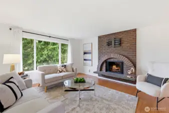 A focal fireplace anchors the living area with charm.